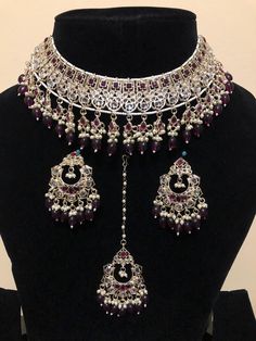 Stunning elegant silver and purple colour necklace set with earrings and tikka.  Please note due to hygiene reasons all jewellery are non returnable, all jewellery are thoroughly checked before posting.  Any questions please do not hesitate to get in touch. Bridal Silver Jewellery Set, Bridal Silver Jewellery, Purple Necklace Set, Necklace Set With Earrings, Wedding Silver, Purple Colour, Purple Necklace, Silver Jewellery Sets, Silver Jewelry Fashion