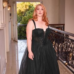 Indulge In The Enchanting Allure Of Our New Formal Sleeveless Plus Size A-Line Tulle Gown, Perfect For Your Next Formal Event. This Exquisite Gown Is Crafted With Delicate Embroidery And Sparkling Sequins, Draping You In An Ethereal Layer Of Tulle That Creates A Dreamy Fairytale-Like Vibe. Designed With Your Curves In Mind, This Gown Is Perfect For Plus-Size Women Who Want To Look And Feel Their Best On Their Special Occasion. Fabric: Tulle Length: Long Color: Black Neckline: Plunging V-Neck Sil Galaxy Gown Plus Size, Glamorous Tulle Gown With V-neck, Sleeveless Black Tulle Princess Dress, Black A-line Tulle Evening Dress, Luxury Black Tulle Gown, Exquisite Gowns, Delicate Embroidery, Cinderella Dresses, Glamorous Dresses