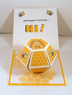 an origami card with a honeycomb and beehive on it that says, just beesign by to say