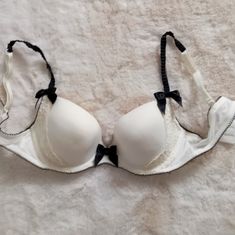 Super Cute And Feminine Nwot Cream Bra With Black Bow Accents And Black Straps. C Cup, Cup Bra, Black Bra, Black Bow, Bra Cups, Bra Women, Black Cream, Women's Intimates, White Stripe