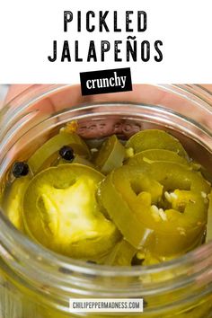 pickled jalapenos in a jar with text overlay that reads pickled jalapenos crunchy