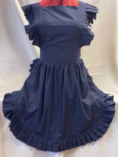 ** FABRIQUE CREATIONS ** VINTAGE / VICTORIAN STYLE FULL APRON / PINNY NAVY ONE SIZE ** BRAND NEW ** Here we have a lovely poly cotton, navy, retro style apron, handmade in house to our own design and to a very high, professional standard. (see photos). Adjustable neck and waist ties so will fit up to a size 22. Other colour combinations available (please see my other items!.) If you don't see what you require, please contact us with your requirements Item specifics: Material - Poly cotton Colour - Navy Size (Approx) - one size About Fabrique Creations: Fabrique Creations is a husband and wife team that work from home. All our aprons are made from our own designs using the best fabrics we can find. We have had our aprons featured on TV, BBC TVs EastEnders (Christmas Day 2012 episode) and se Victorian Apron, Victorian Aprons, Cute Aprons, Uk Brands, Half Apron, Retro Mode, Handmade Brand, Mount Pleasant, Vintage Victorian