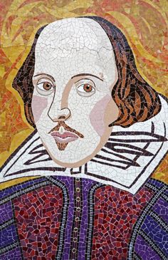 a close up of a mosaic with a man's face