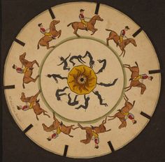 an artisticly painted plate with horses and men running in the circle on it's surface