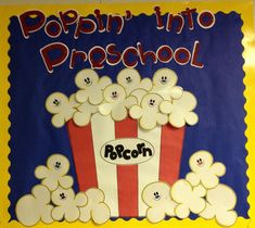 a bulletin board with popcorn on it and the words popin'into preschool written in black