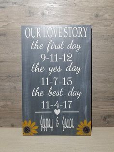 a sign that says our love story the first day