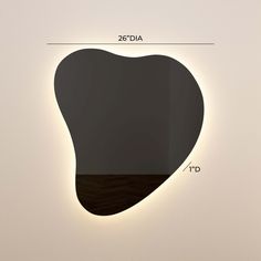 a heart shaped cutout in the middle of a white wall with an area for text