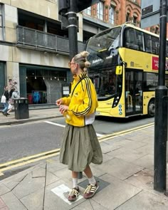 Sporty Long Skirt Outfits, Colorful Sneakers Outfit Street Style, Adidas Japan Shoes Outfit, Midi Bubble Skirt Outfit, Outfits With A Pop Of Color, Adidas Track Jacket Outfit Street Style, Long Bubble Skirt Outfit, Track Jacket Outfit Street Style, Long Skirt And Sneakers Outfit