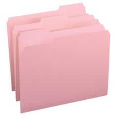 pink file folders stacked on top of each other