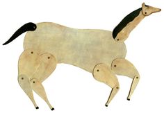 an animal made out of wood with black legs and tail, standing on its hind legs