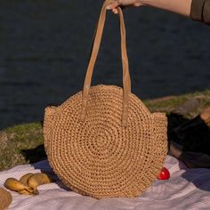 Introducing our Round Straw Bag - the epitome of summer chic and beach vibes. This rattan beach tote bag, also known as the Bali Bag, is the perfect accessory to elevate your style and bring a touch of bohemian charm to any outfit. Shape and Style: The bag's round shape adds a unique and trendy element to your look, making it a standout piece wherever you go. Its boho-inspired design is perfect for beach days, vacations, or casual outings, giving you that relaxed and carefree feel. Versatile Sho Chic Beach Bag Made Of Natural Fiber, Chic Summer Bags Made Of Natural Fiber, Bohemian Summer Straw Bag With Double Handle, Bohemian Summer Straw Tote Bag, Bohemian Jute Beach Bag For Vacation, Bohemian Double Handle Straw Bag For Summer, Bohemian Beach Bag In Natural Fiber For Vacation, Bohemian Summer Bags In Natural Color, Bohemian Beach Bag With Large Capacity