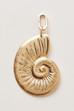 Add a sea-inspired touch to every style with this stunning bag charm featured in a shell silhouette and worn metal fabrication for a true lived-in look. | Solid Shell Bag Charm by Free People in Gold Shell Silhouette, Shell Bag, Sea Inspired, Bag Charms, Wallet Pouch, Unique Bags, Metal Fabrication, Boho Clothing, Boho Outfits