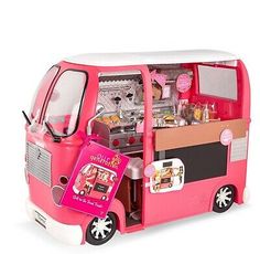 a pink and white food truck with lots of items in it's back end