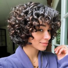 Voluminous Curly Bob with Side Bangs A Symmetrical Bob Curly Hair, Curly Asymetrical Bobs, Curly Hair Bobs Angled, Curly Bob Hairstyles 2024, Waterfall Curls, Curly Angled Bobs, Curly Undercut, Curl Enhancer