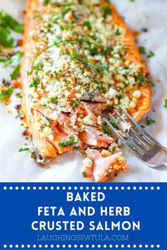 a piece of salmon with parsley on it and a fork