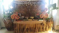 a table topped with lots of food next to a window