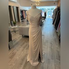 a dress on display in a clothing store