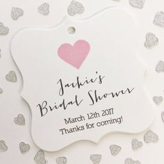 a white tag with a pink heart on it that says, bridal show march 24th 2011 thanks for coming