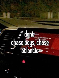 a car dashboard with the words don't chase boys, chase atlantic