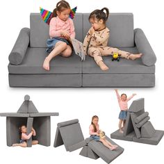 two children sitting on a couch with their arms in the air and one holding a book