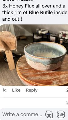 a bowl sitting on top of a wooden table