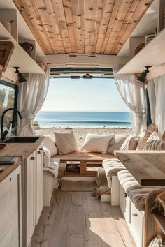 the inside of a camper with lots of windows