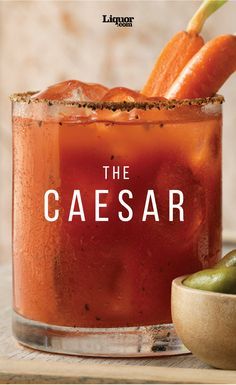 the caesar cocktail is served in a glass with an orange garnish