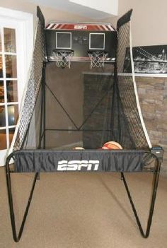 an indoor basketball game set up in a living room