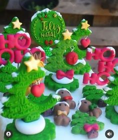 there is a cake decorated like christmas trees