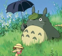 an image of people in the grass with umbrellas and totoro characters behind them