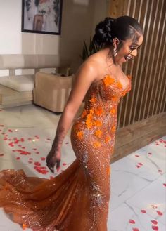 Beaded Nigerian Dress, Ghanaian Prom Dress, Orange And Gold Outfit, Prom Dress Inspiration Black People, Brown Prom Dresses Black Women, Orange Prom Dresses Black Women, Orange Dress Prom, Prom After Party Outfit, Matric Dance Dresses South Africa