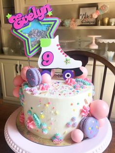 "This adorable roller skate cake topper will be the perfect addition to your little one's birthday cake! This is a shaker topper filled with star sequins! The topper features the name & age of your child. The topper pairs perfectly with the party hat shown! To purchase both at a discount choose our hat & topper option!💖 Overall size of the topper is 8\" wide by 7\" height." Skate Cake, Roller Skate Cake, Golden Bday, Shaker Topper, Shaker Cake Topper, Galaxy Party