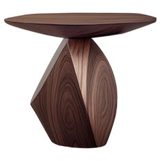 a wooden table with an unusual shaped top