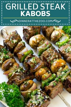 skewers of meat and vegetables on a plate with parsley garnish