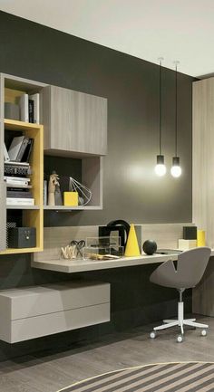 an office with gray walls and yellow accents