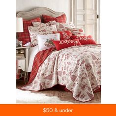 red and white bedding with flowers on it