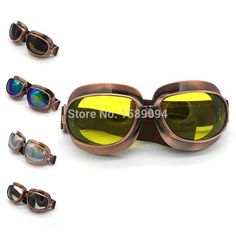 several pairs of goggles with yellow mirrored lenses on them, all in different shapes and sizes