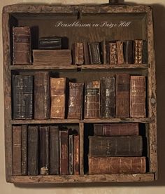 an old wooden book shelf filled with books