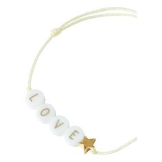 DÉtails : Message bracelet. Adjustable. Composition : Beads: : 100% Ceramic, Pendant : 100% Gold plated, String : 100% Polyester. Fabrication : France. Ceramic Beads Bracelet, Love Ceramic, Message Bracelet, Bracelet Love, Ceramic Pendant, Ceramic Beads, Bead Bracelet, Arm Band, Vanilla