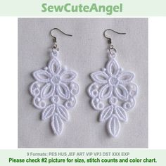 the earrings are made out of white crochet