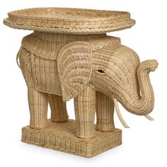 an elephant stool made out of wicker