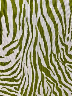 a green and white zebra print fabric