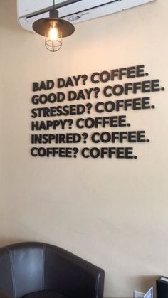 a coffee shop with a sign on the wall that says bad day coffee