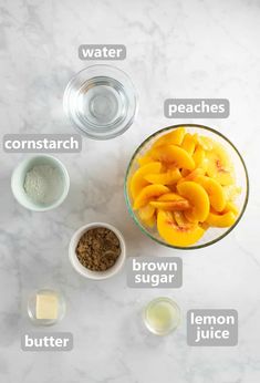 ingredients to make peach ice cream on a marble counter top