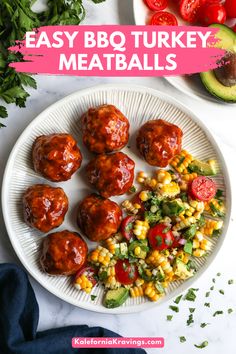 easy bbq turkey meatballs on a plate with corn, tomatoes and avocado