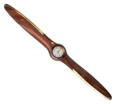 a wooden watch with a clock face on it