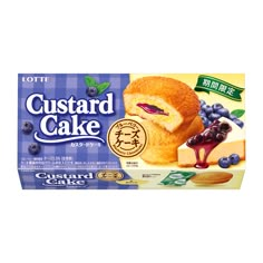 a carton of custard cake with blueberries