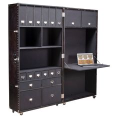 an open bookcase with drawers and a tray