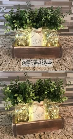 three mason jars filled with flowers and greenery are stacked on top of each other