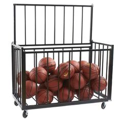 several basketballs are stacked in a metal basket with wheels on the bottom and sides